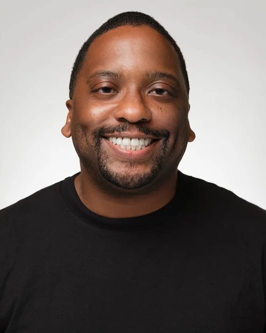 Headshot by Aha! Concepts