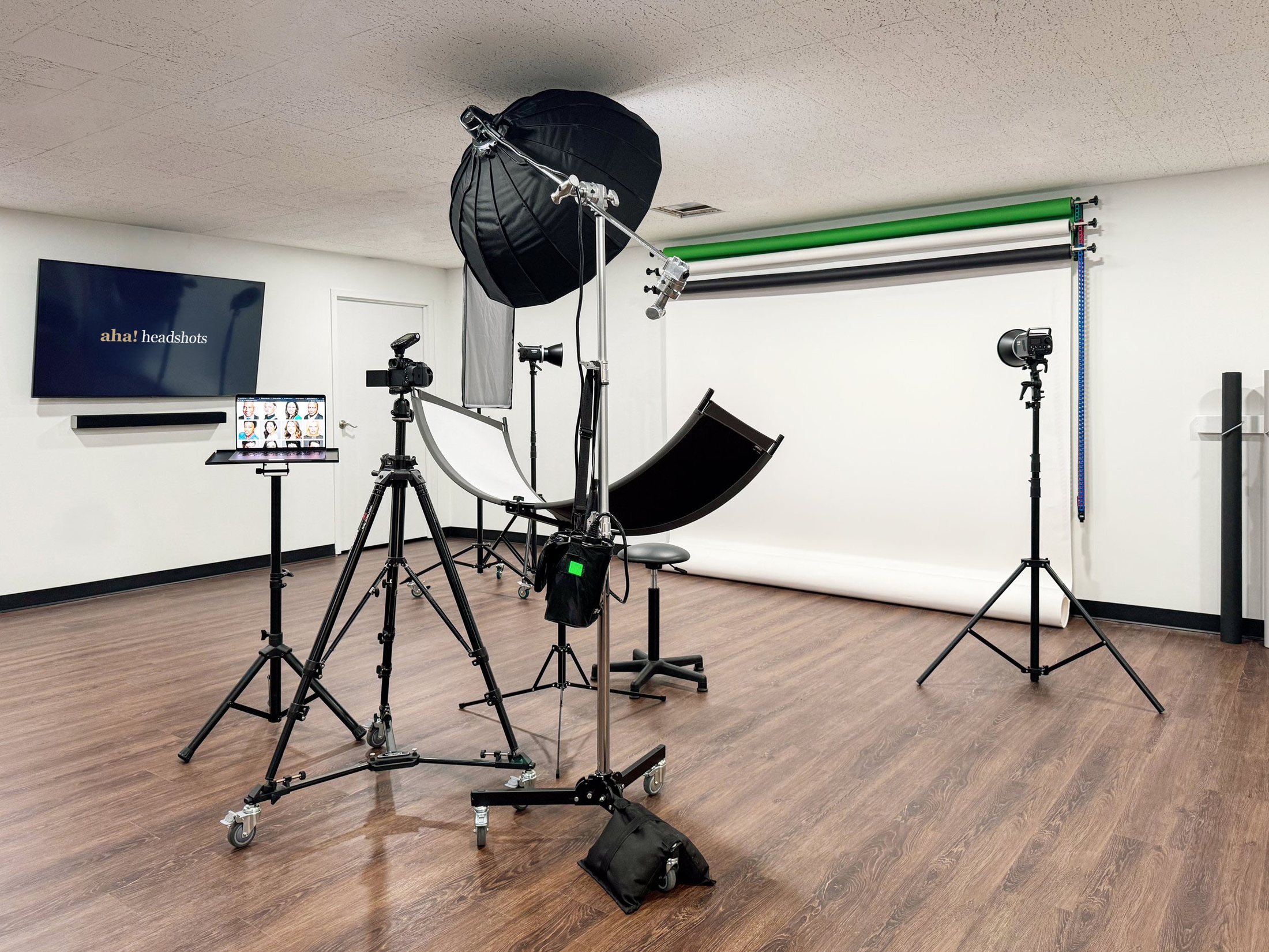 The Aha! headshot studio: lights, stands, and a backdrop